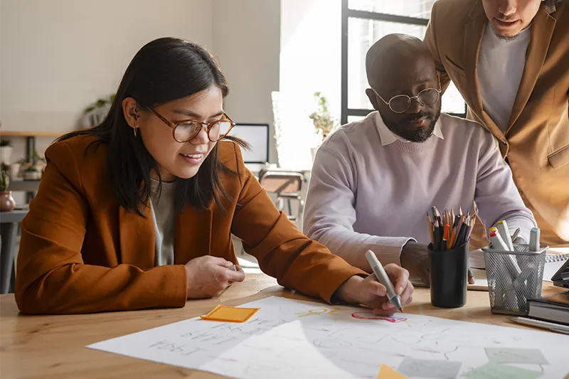 Collaborateurs du Groupe, représentant la diversification et la vision d’avenir.